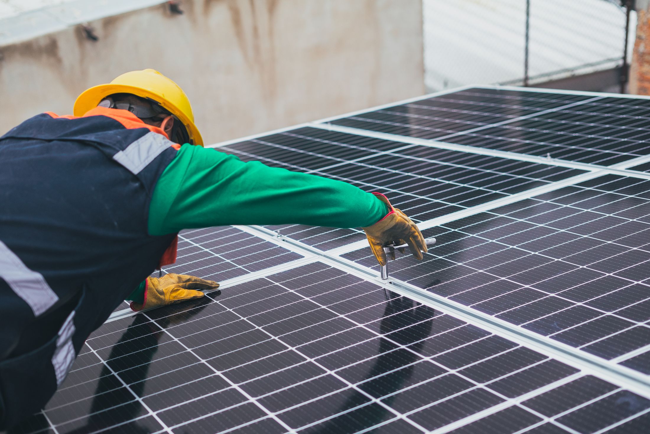 Technician working on solar modules